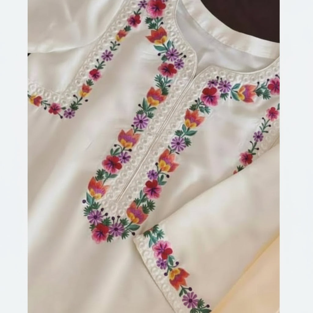 Prismatic Petals: Where clean minimalism meets a splash of vibrant, hand-stitched detail